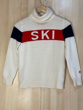 Perfect Moment Cream Turtleneck Ski Sweater with Red and Navy Accents